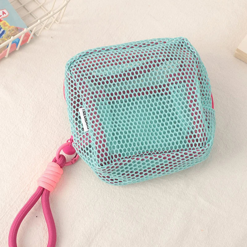 Liten väska för smink, pengar och tamponger