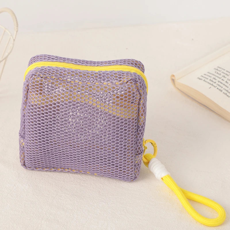 Liten väska för smink, pengar och tamponger