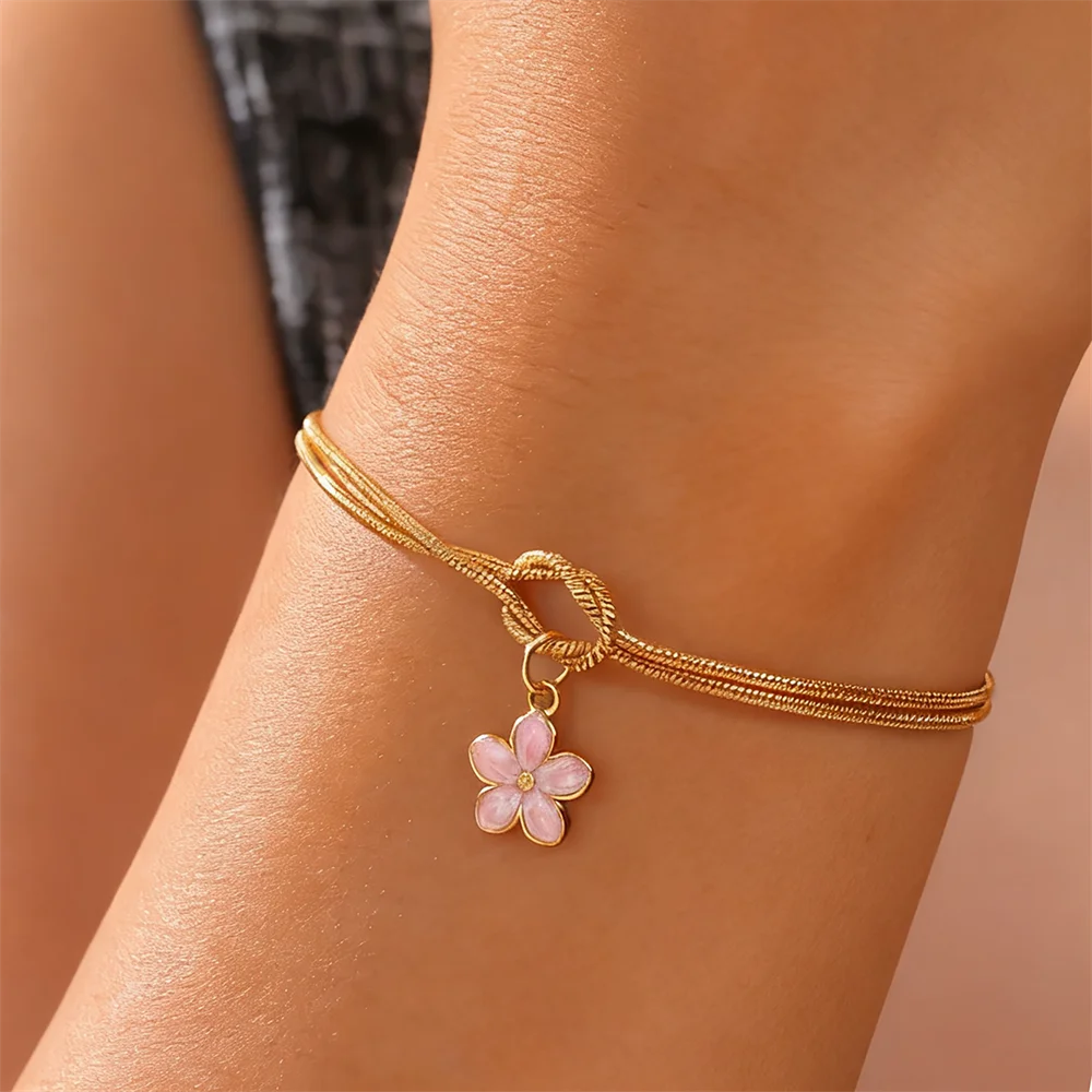 Armband med knut och söt blomma
