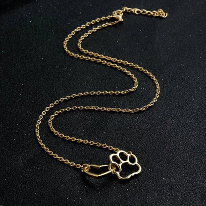 Halsband med hjärta och katt- eller hundtass