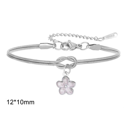 Armband med knut och söt blomma
